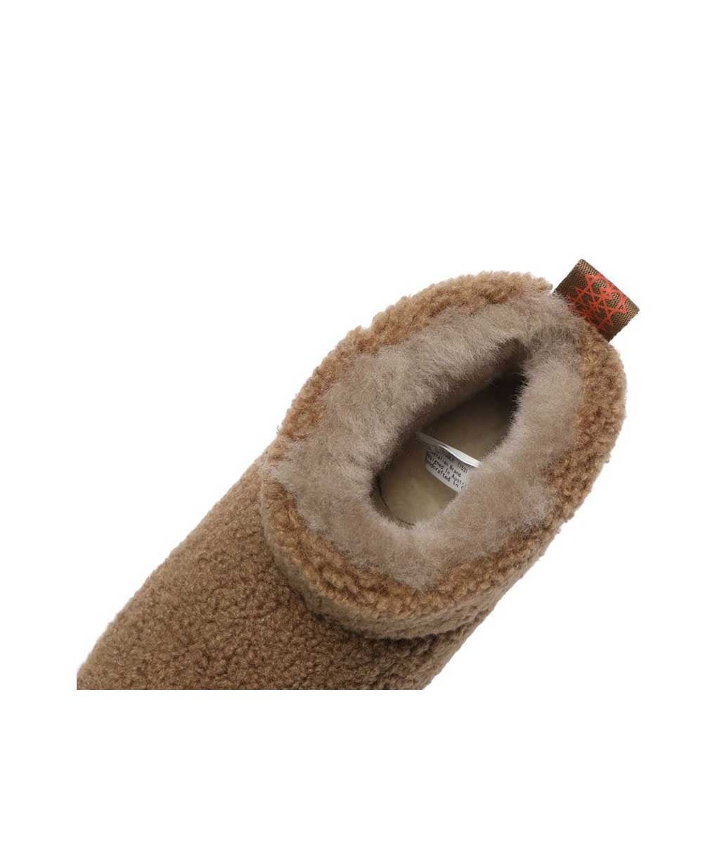 Bottes à plateforme ultra en laine bouclée pour femme