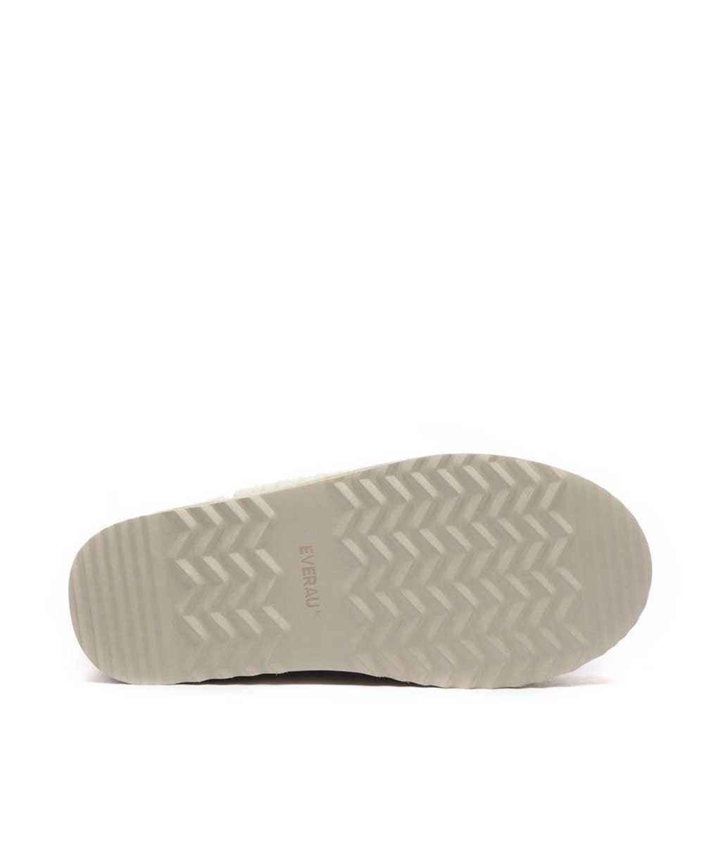 Bottes à plateforme ultra en laine bouclée pour femme